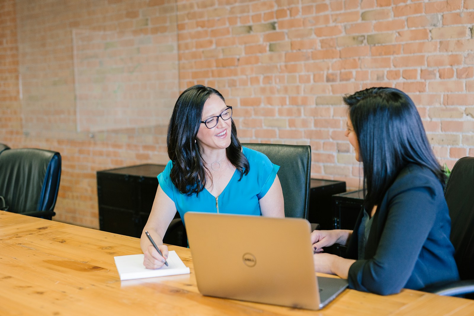 Business owners and advisors reviewing financial information